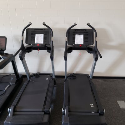 two treadmills lined up